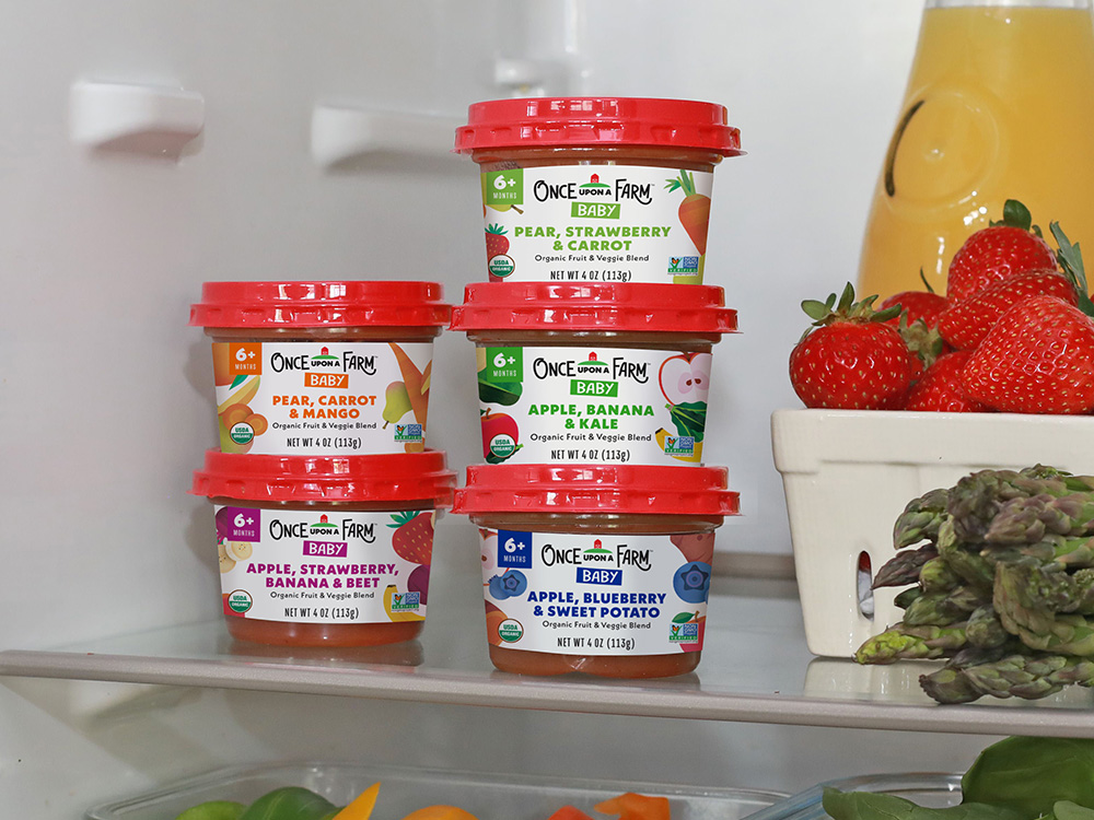 Photo of baby food flavor varieties with fruit and vegetables in fridge