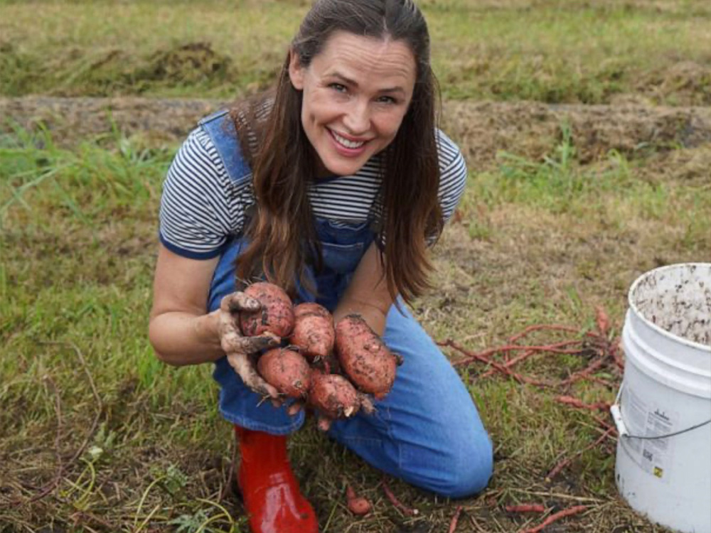 Jennifer Garner holding potatoes for Once Upon a Farm