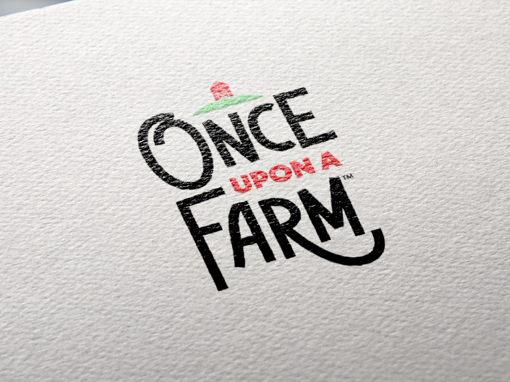 Once Upon a Farm logo mockup on paper
